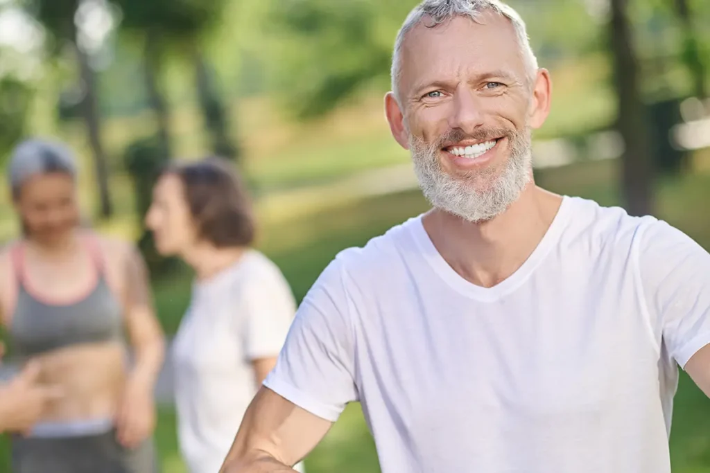 Group of people before workout in the park