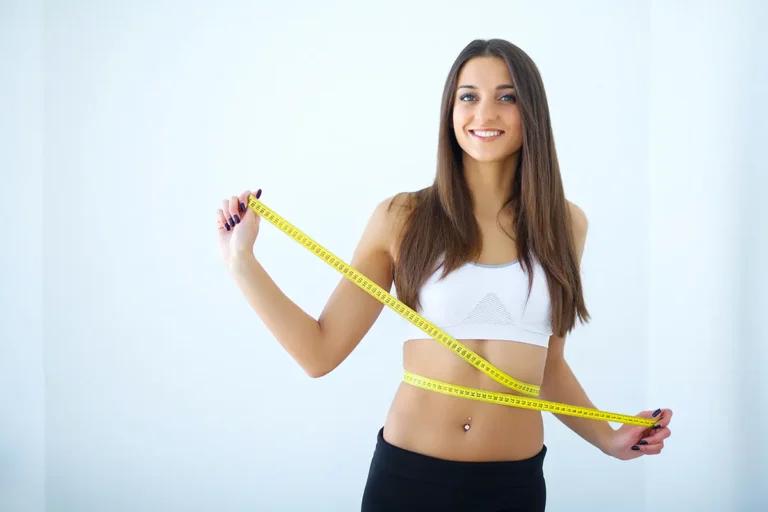 Diet girl taking measurements her body