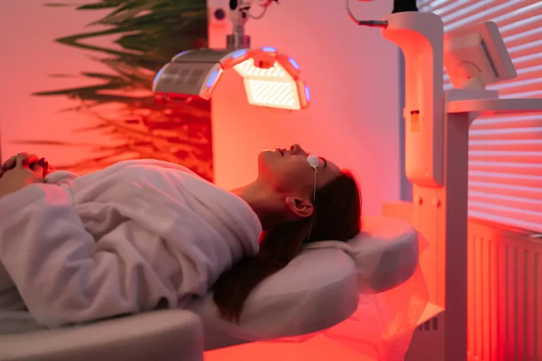 Side view of a female undergoing red light therapy