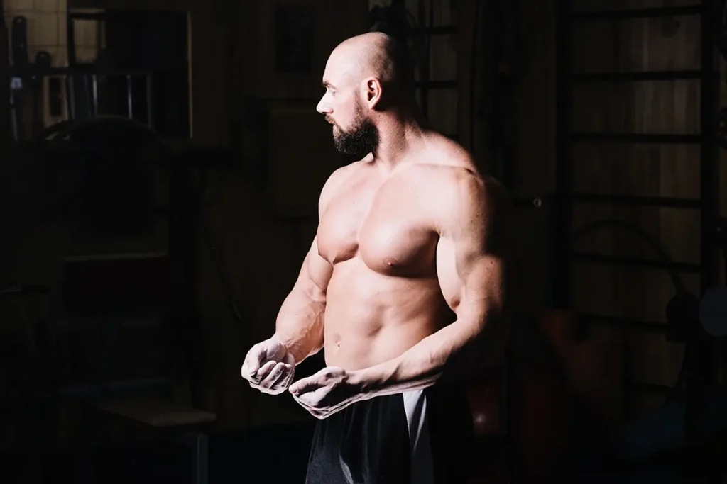 Muscular man clenching fists, Hormone Balance in Men