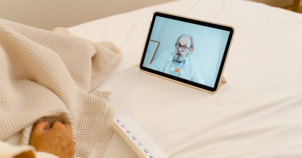 Patient in bed having a virtual consultation with a doctor via tablet. — Best Telehealth Clinic in United States